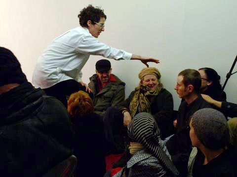Shannon Cochrane: shaking hands, 2010, performance shot, <em>CHAOS</em>; photo Jordan Hutchings; courtesy CHAOS
